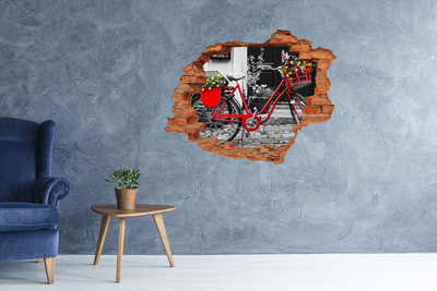 Hole in the wall decal A red bicycle in an urban setting