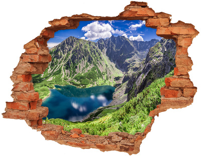 Hole wall sticker Mountain valley with a lake