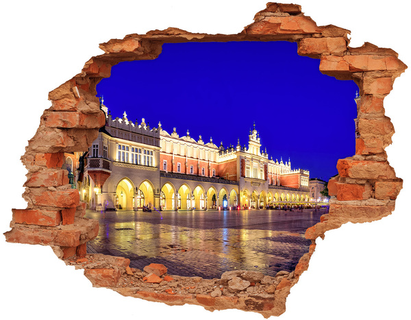 Hole in the wall sticker Krakow's Main Market Square at night