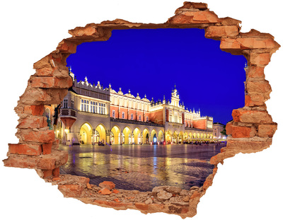 Hole in the wall sticker Krakow's Main Market Square at night