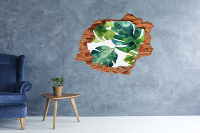 3D wall hole Green tropical leaves in a damaged wall