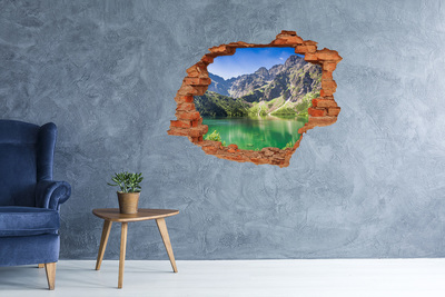 Hole wall sticker Mountain landscape by the lake