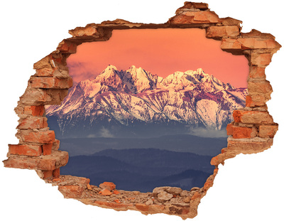 Hole wall sticker Mountains in the glow of sunset