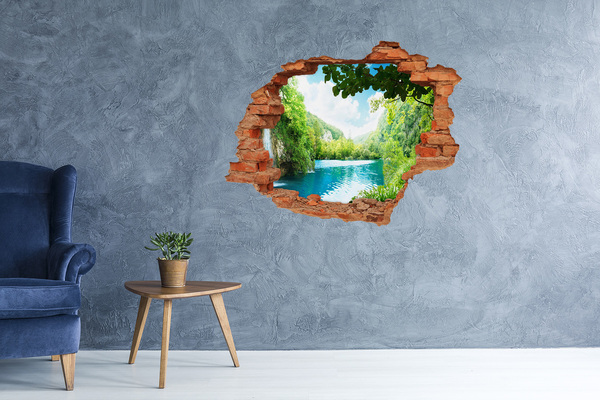 Hole wall sticker Green valley with a lake