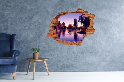 Hole in the wall sticker Sunset over the city