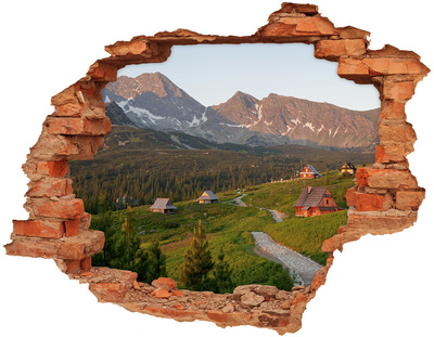 Hole wall sticker Mountain valley with huts