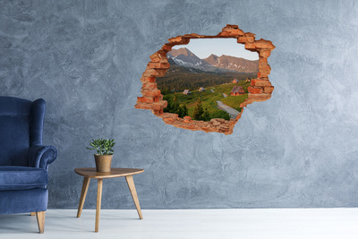 Hole wall sticker Mountain valley with huts