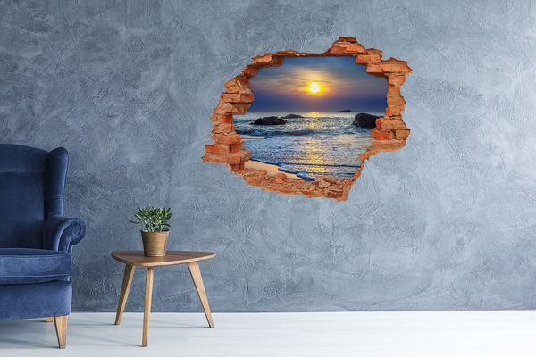 Hole wall sticker Sunset over the sea
