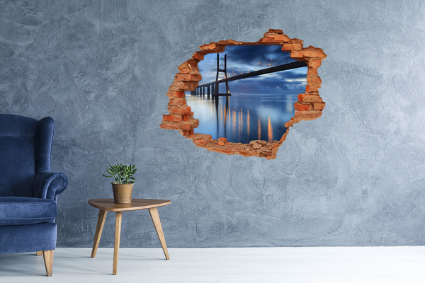 3D wall hole wallpaper A bridge over the water in a night scene
