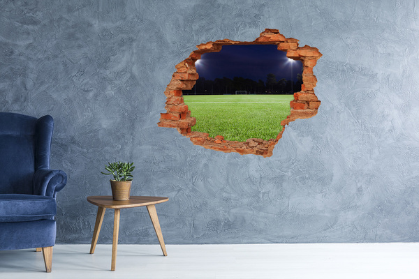 Hole in the wall sticker Football pitch at night