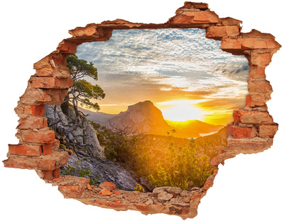 3D wall hole wallpaper Sunset in the mountains
