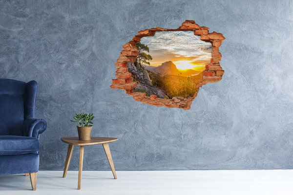 3D wall hole wallpaper Sunset in the mountains
