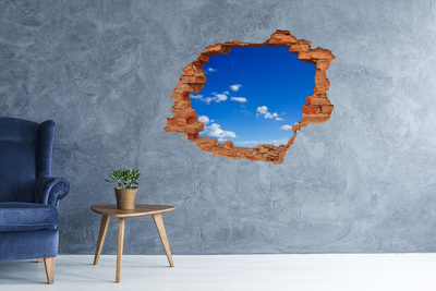 Hole in the wall sticker Blue sky with clouds