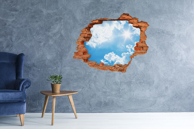 Hole in the wall sticker Blue sky with clouds