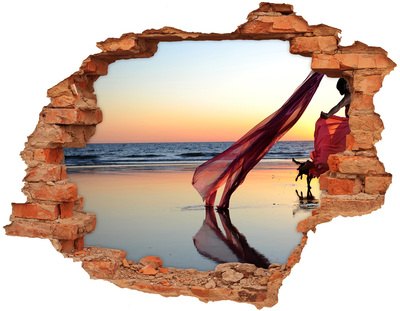 Hole in the wall sticker Dancing on the beach at sunset