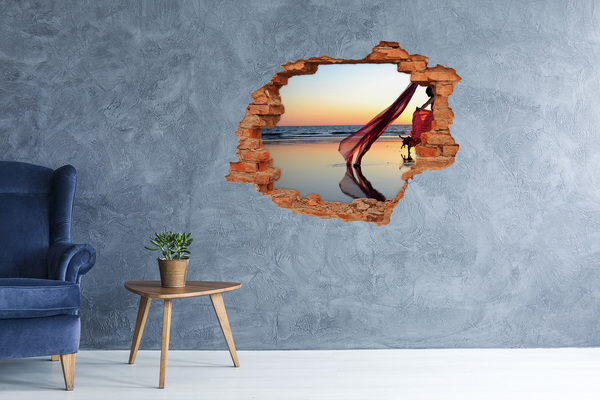 Hole in the wall sticker Dancing on the beach at sunset
