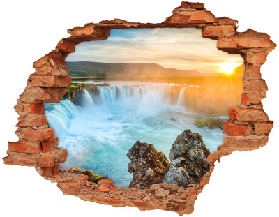 Hole in the wall sticker Waterfall in the setting sun