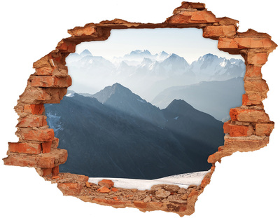 Hole wall sticker Mountain landscape through a hole in the wall