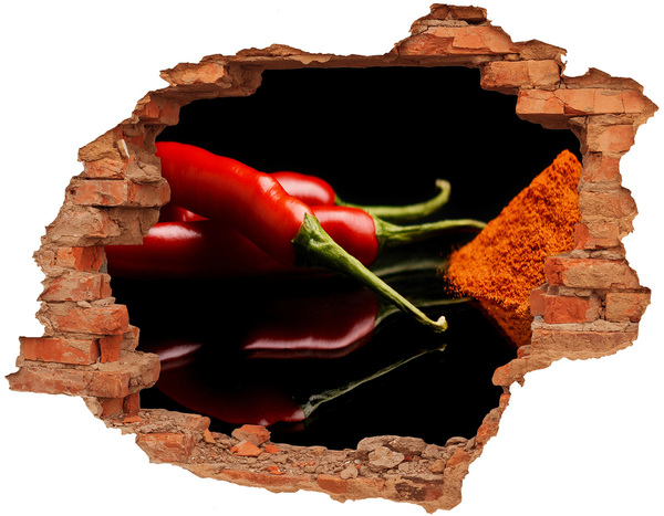Hole wall sticker Chili peppers on a black background