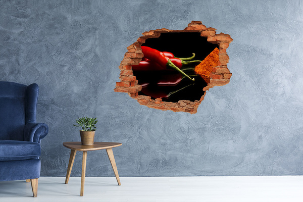 Hole wall sticker Chili peppers on a black background