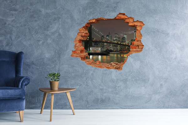 Hole in the wall sticker New York at night through a hole in the wall