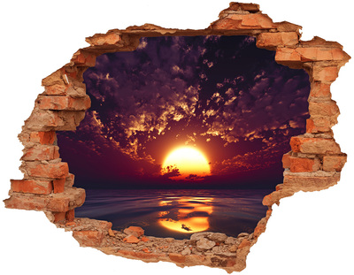 Hole in the wall sticker Sunset over the sea