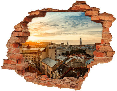 Hole wall sticker Sunset over the city