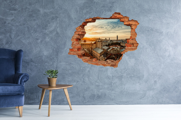 Hole wall sticker Sunset over the city