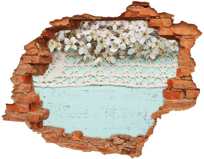 Hole in the wall sticker Floral motif on a blue wood background