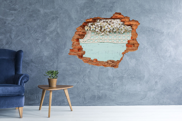 Hole in the wall sticker Floral motif on a blue wood background