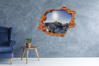 Hole in the wall decal Mountain landscape with sun rays