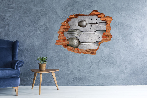 Hole in the wall sticker A broken wall with a view of the cutlery