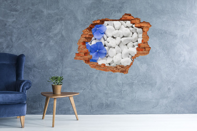 Hole in the wall decal Beach pebbles with a blue accent