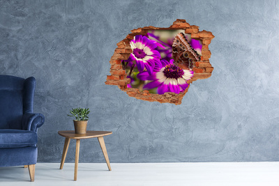Hole wall sticker Butterfly on flowers in a hole in the wall
