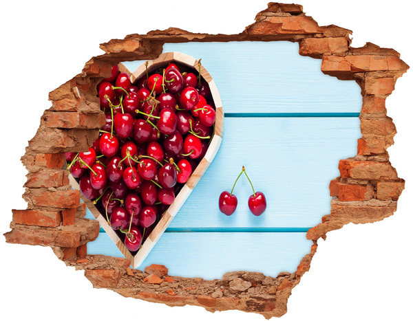 Hole wall sticker Sweet cherries on a blue background
