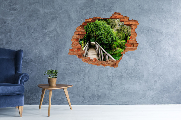 Hole in the wall sticker A green paradise with a wooden bridge