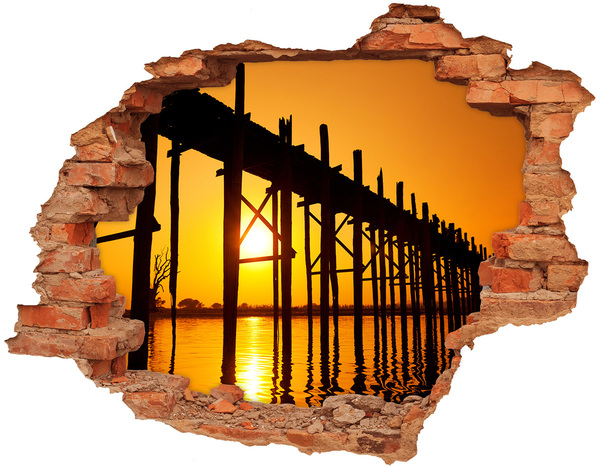 3D wall hole wallpaper Sunset over the pier