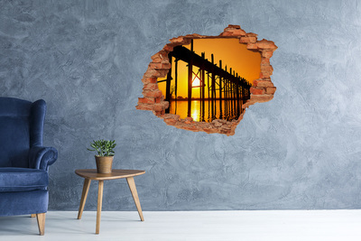 3D wall hole wallpaper Sunset over the pier