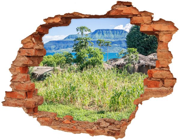 Hole in the wall sticker Tropical landscape behind the hole in the wall