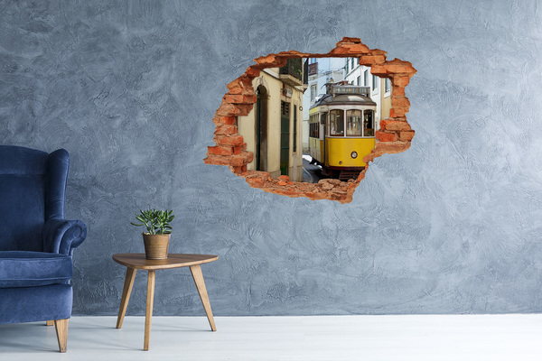 Hole wall sticker A yellow tram in a narrow street