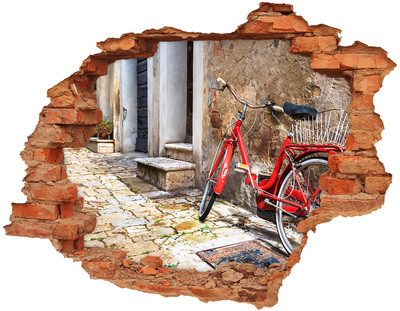 Hole in the wall sticker A red bicycle in a charming street