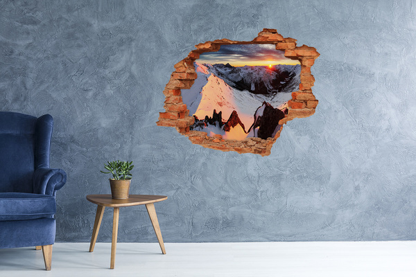Hole wall sticker Mountain sunset