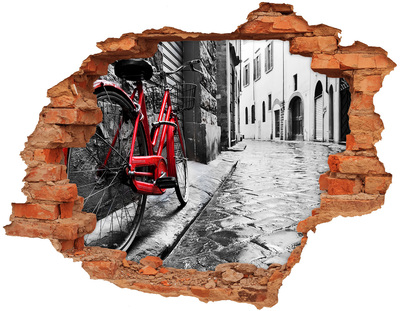 Hole in the wall sticker A red bicycle in a charming street