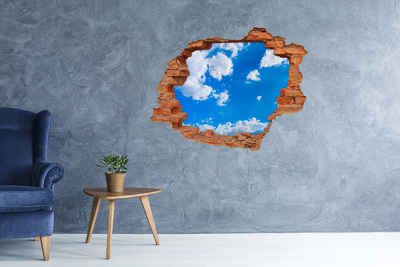Hole in the wall sticker Blue sky with clouds