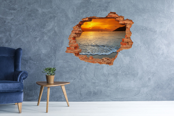Hole wall sticker Sunset over the sea