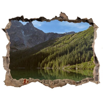 Hole wall sticker Mountain lake in the valley