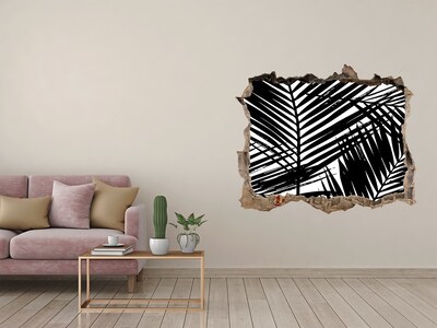 Hole wall sticker Tropical leaves in a hole in the wall