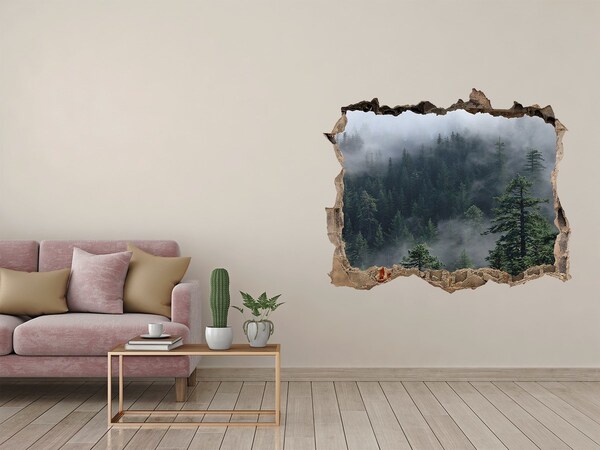 Hole in the wall sticker Green forest in the clouds