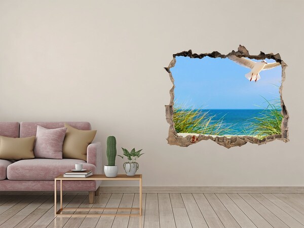 Hole wall sticker View of the beach with a seagull
