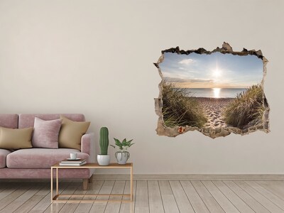 Hole wall sticker Sunset over the beach